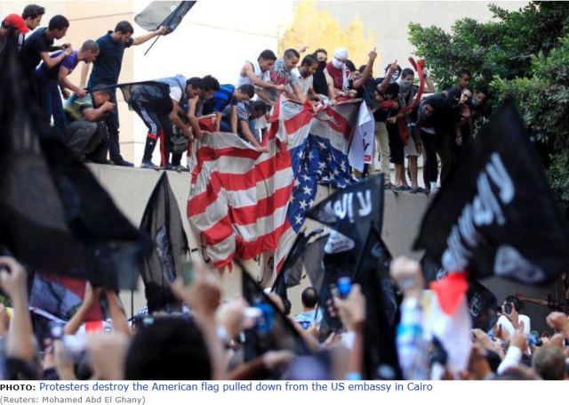 Old Glory is down.Islam flag is up